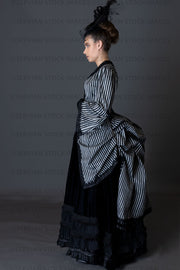 Victorian woman in a striped silk 1870s bustle ensemble (Sarah 8803)